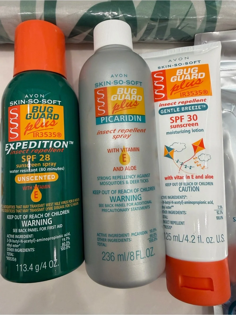 Avon Skin-So-Soft Sun & Bug Care Set with Green Bamboo Print Pouch Bundle